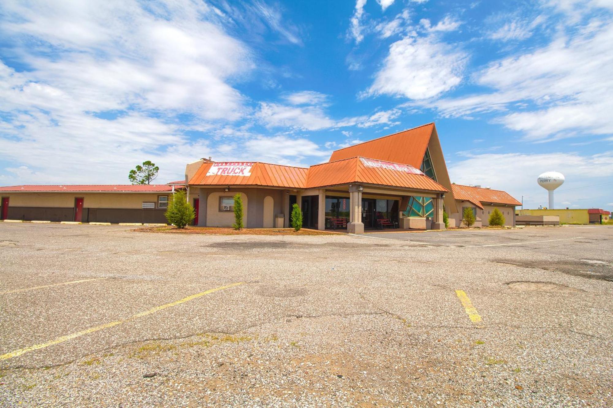 American Best Inn By Oyo I-35 Perry Near Lake Mcmurtry Eksteriør billede